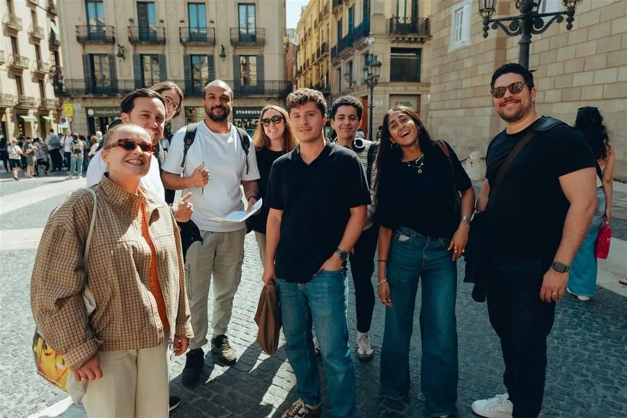 Colleagues walking together through the Gothic Quarter