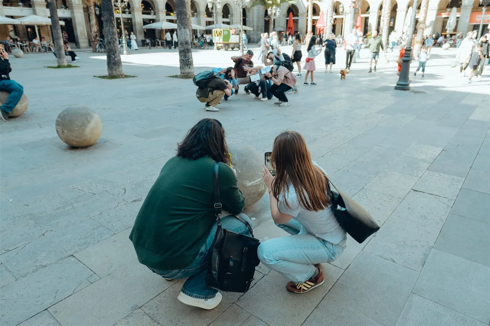 A small corporate team on a Barcelona treasure hunt